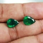 Two pear shape emeralds pair in top color range