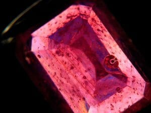 Glass-filled Composite Ruby - Gas Bubble seen at the right side of the stone
