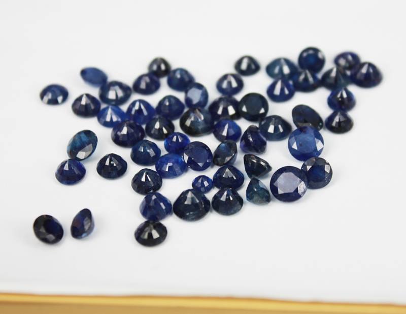 Glass-filled blue sapphire lot that came across our office last month. Looks like normal sapphires with naked eye, but when you see it under gem loupe or microscope you can tell its not a 